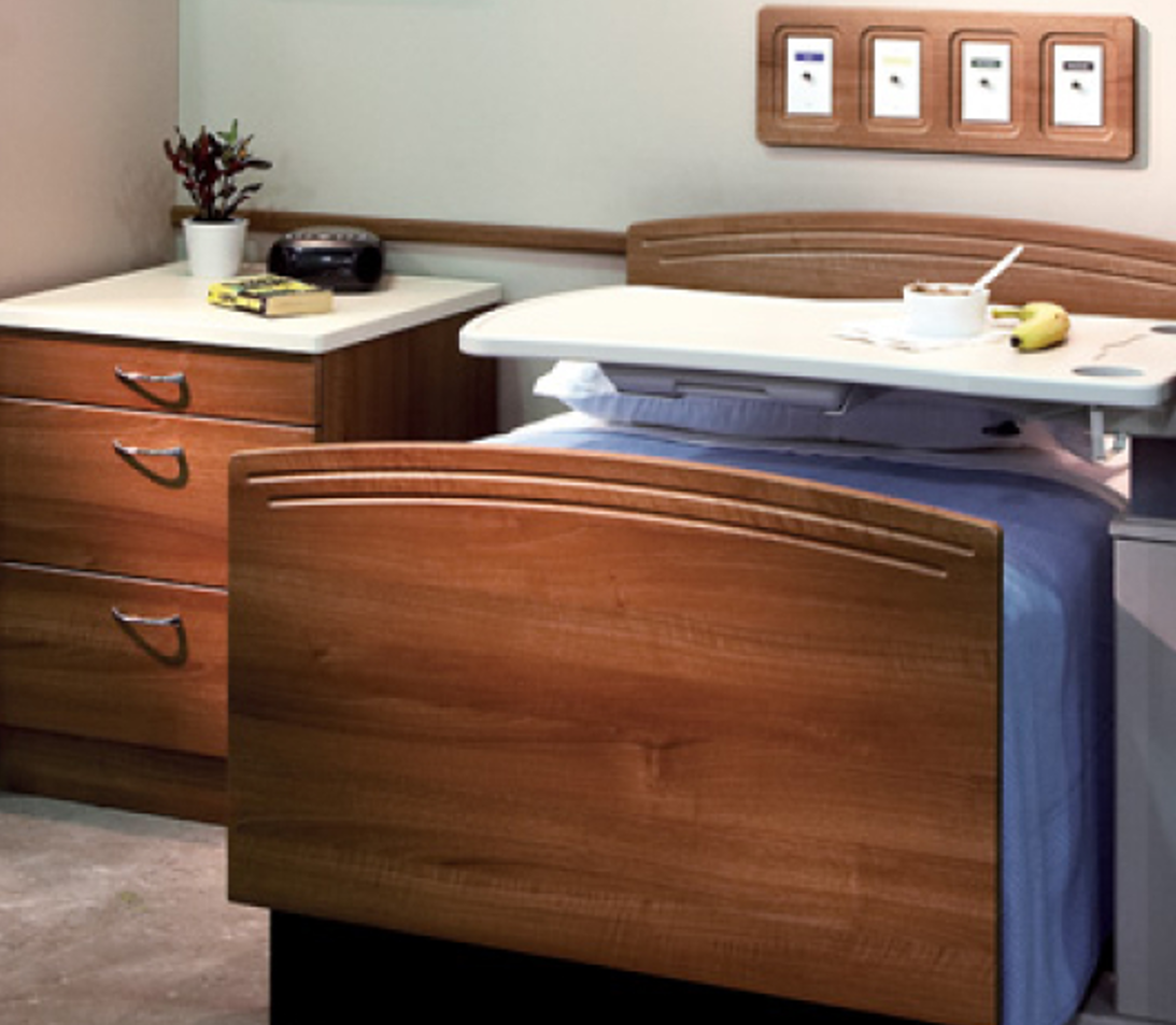 Thermofoil headwall and cabinetry in patient room